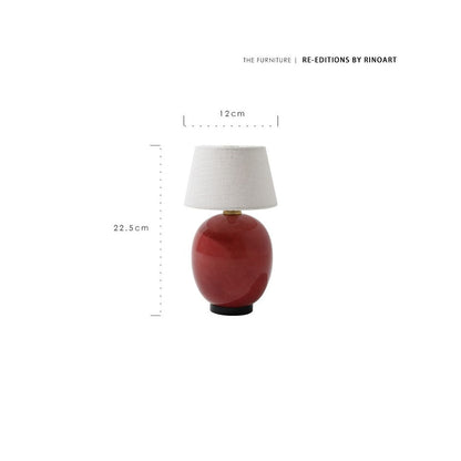Red lamp with white shade and measurement details on a white background, featuring Rinoart branding.