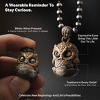 Owl fidget pendant with press activated blinking eyes and feather details